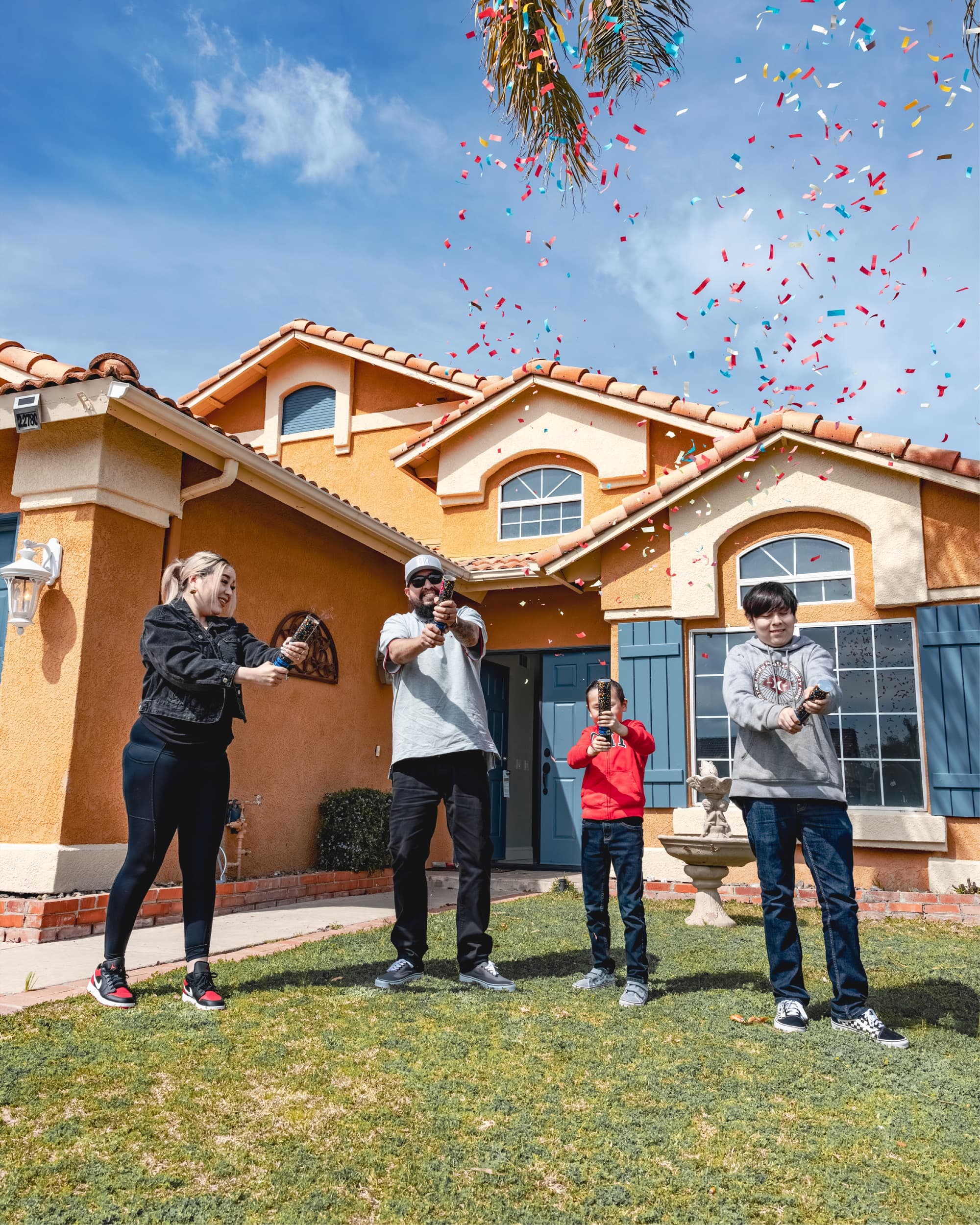 MUVE Real Estate clients at closing with Marco Aguilera, keys in hand (2 of 4)